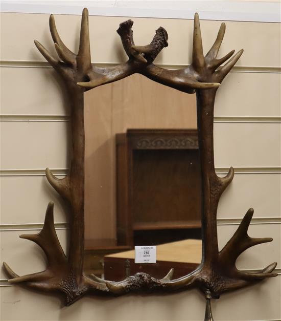 A faux stag antler framed mirror W.54cm